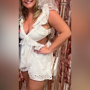 White crochet style romper with open sides/back